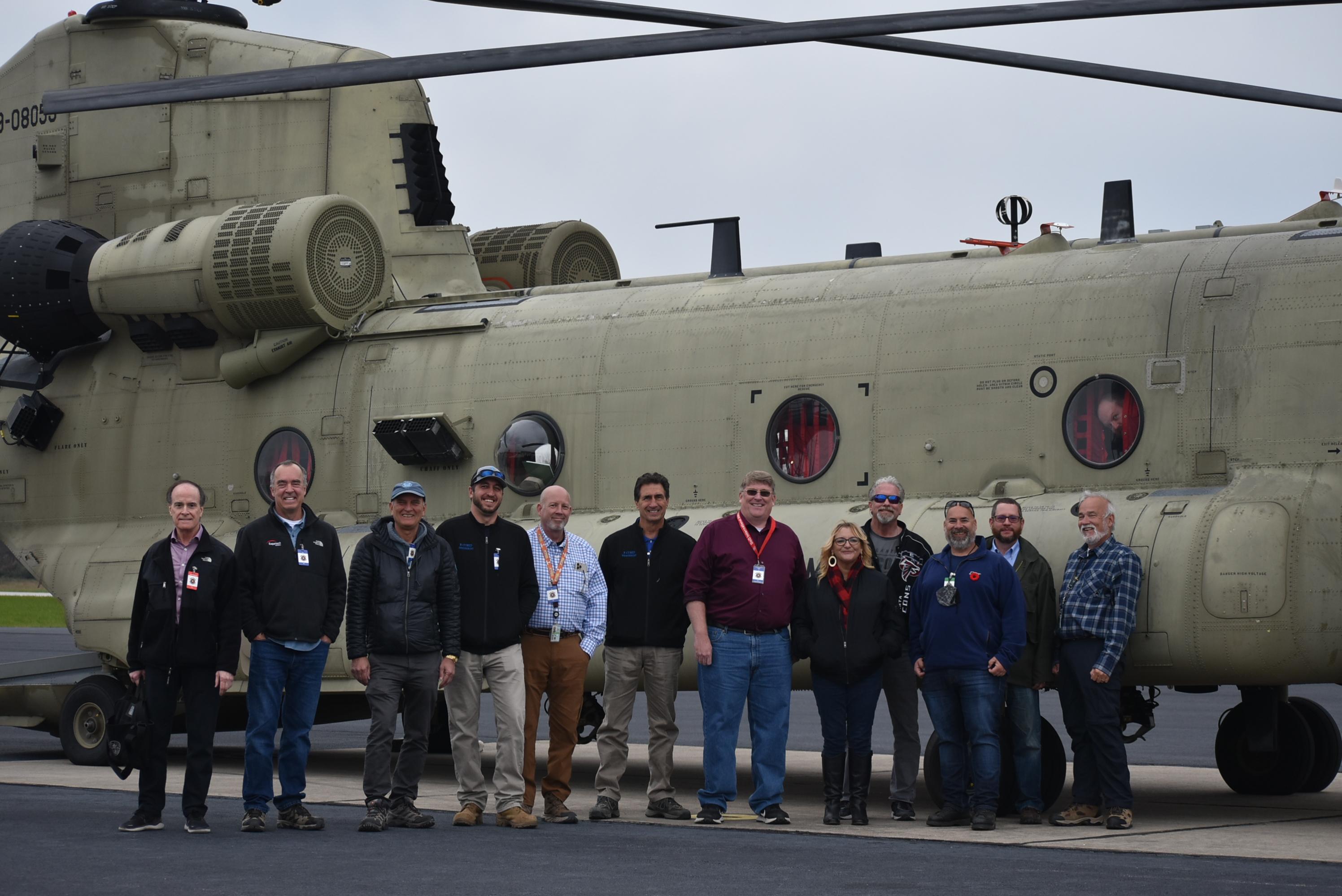 R Cubed Engineering team with CH-47 aircraft